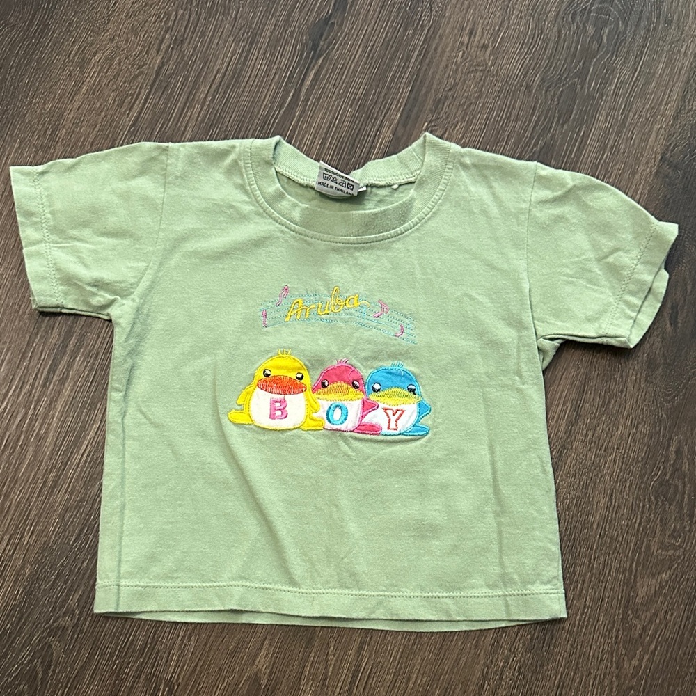 bebe Green Tee with Colorful Characters Aruba Boy